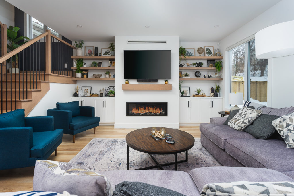 Custom built-in wooden shelving in the living room.