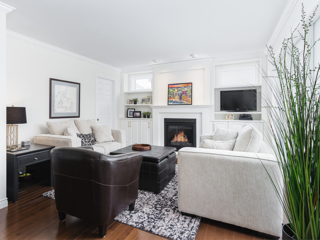 Traditional style white mantel over fireplace